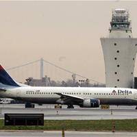 Plane Skids Off LaGuardia Runway